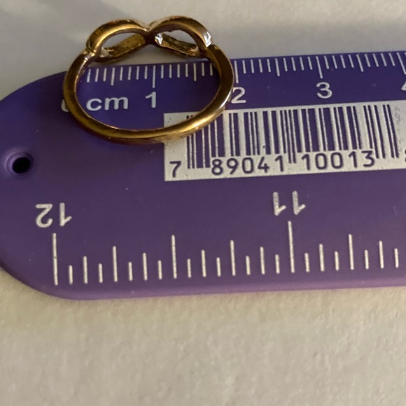 Gold infinity design ring. Costume jewelry - Picture 2 of 5